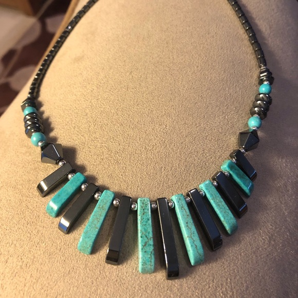 Jewelry - Necklace in turquoise and dark gray beads.